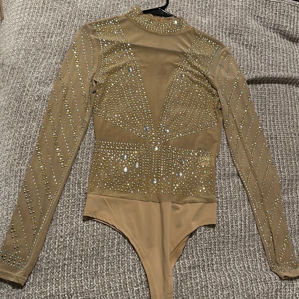 Tan body suit